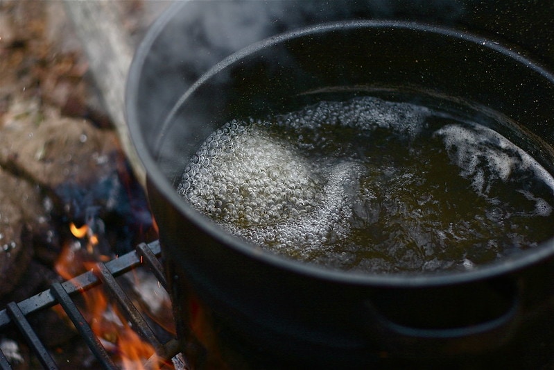 boiling maple sap to make maple syrup