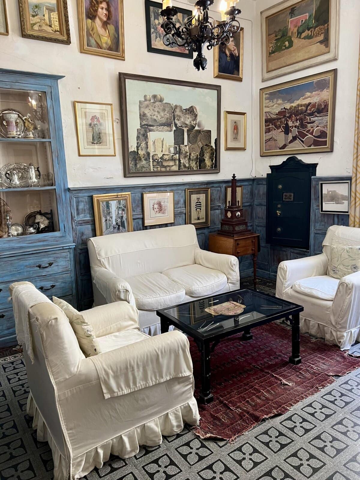 Elegant historic room inside Casa Rocca Piccola in Valletta, Malta, showcasing antique furniture and artwork from the Maltese nobility.